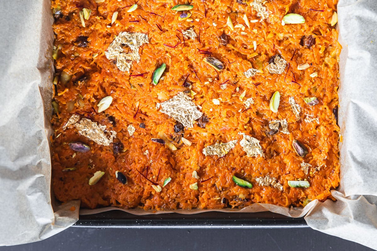 Gajar ka halwa - Carrot halwa or pudding in a square tin.