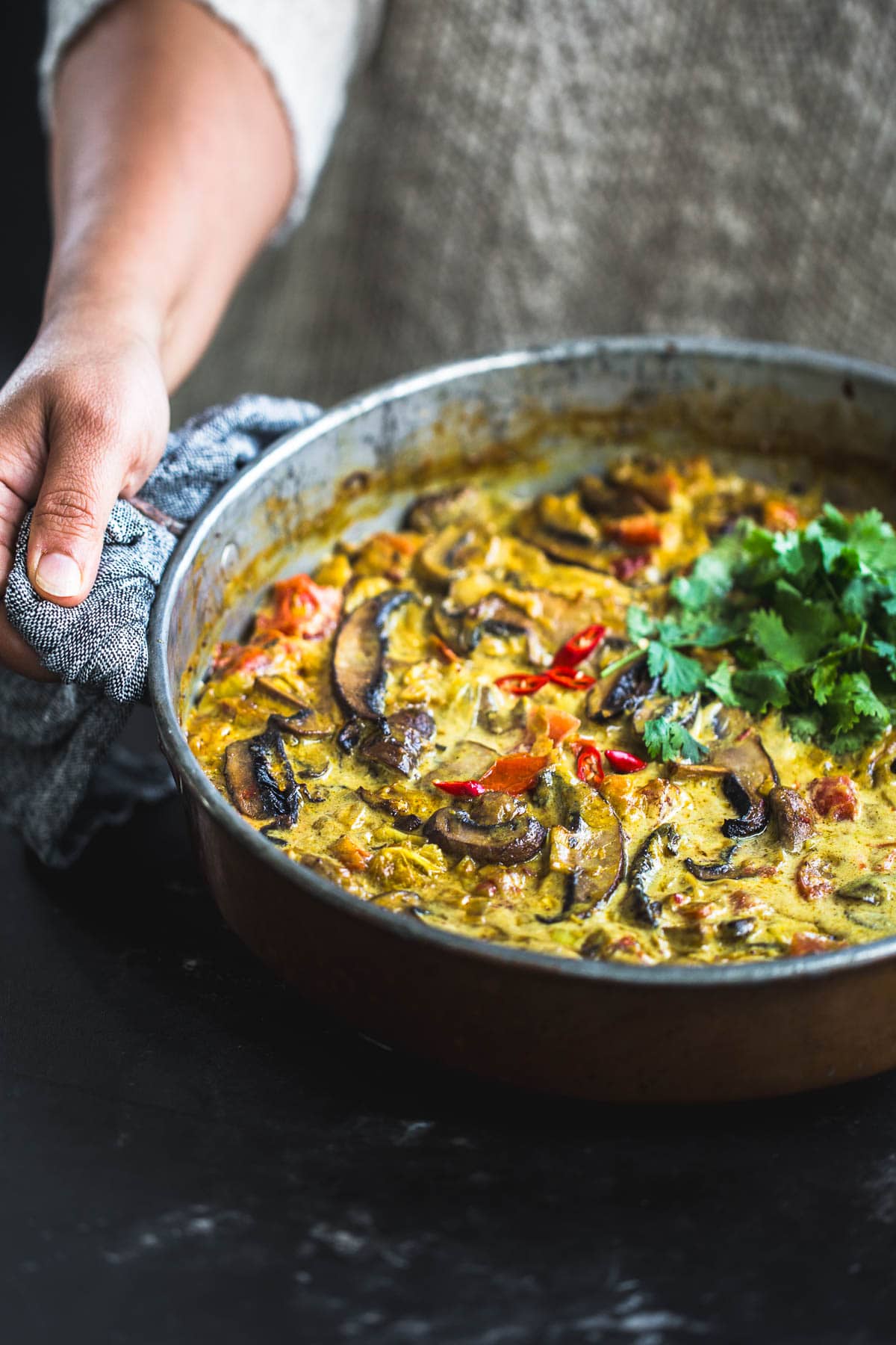 Baked Mushroom Curry served in a pan.